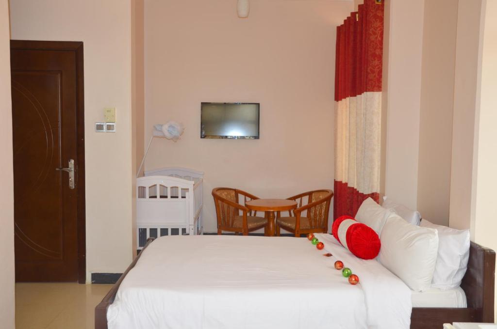 Postel nebo postele na pokoji v ubytování Dreams Hotel Zanzibar