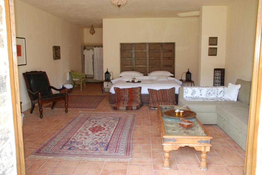 Postel nebo postele na pokoji v ubytování Hotel Podere Conti
