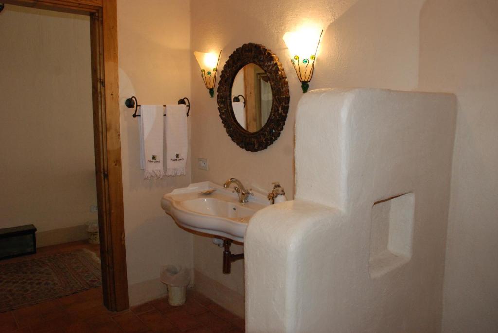Koupelna v ubytování Hotel Podere Conti