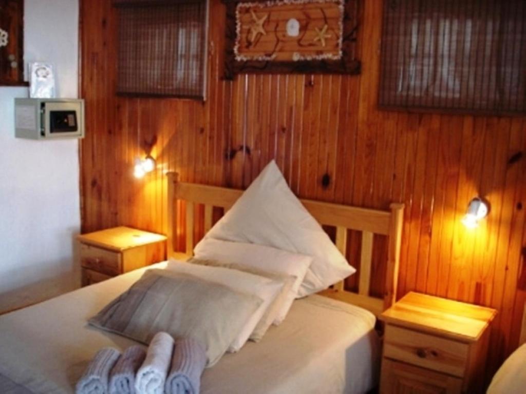 Postel nebo postele na pokoji v ubytování Bay Cove Inn