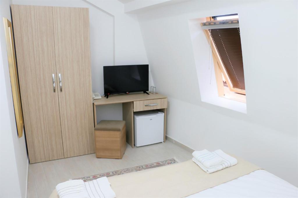 TV a/nebo společenská místnost v ubytování Hotel Old Konak