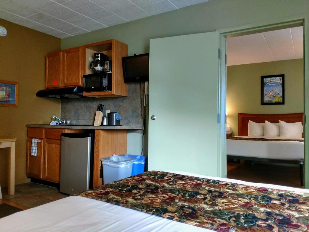 Postel nebo postele na pokoji v ubytování Marlane Motel