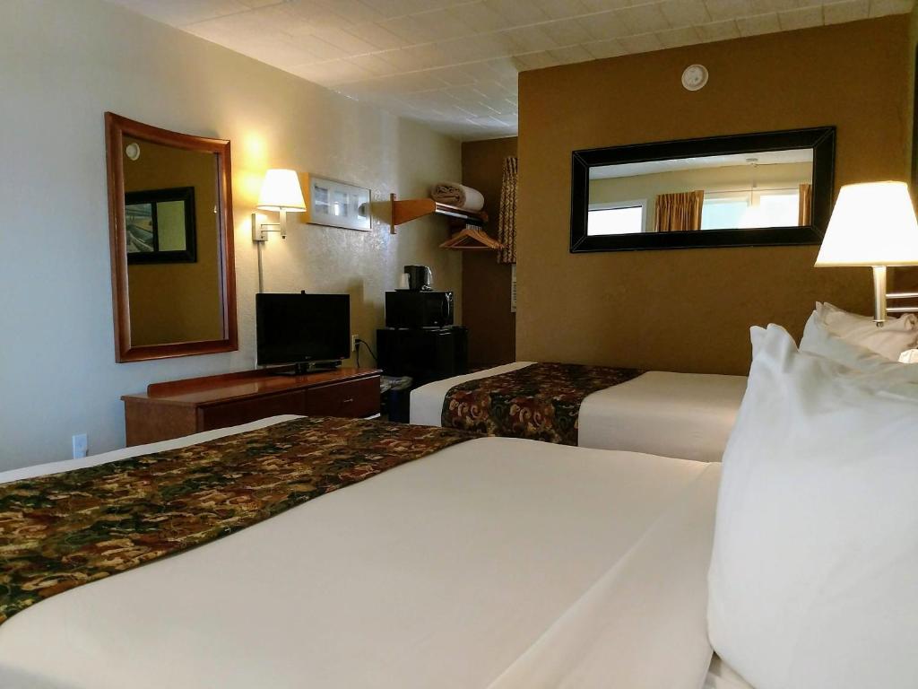 Postel nebo postele na pokoji v ubytování Marlane Motel