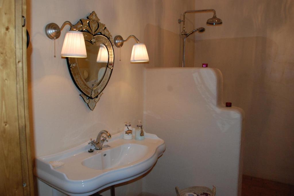Koupelna v ubytování Hotel Podere Conti