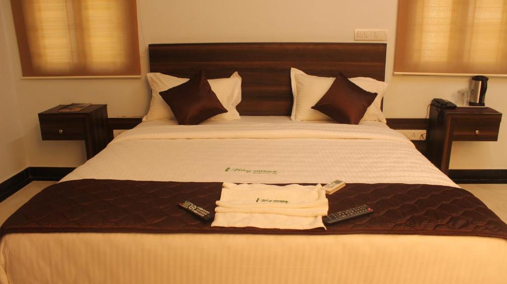 Postel nebo postele na pokoji v ubytování Hotel I-Way Residency Perungudi