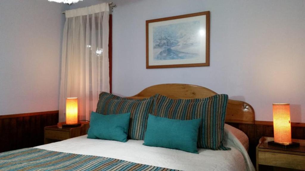 Postel nebo postele na pokoji v ubytování Hotel y Cabañas Molino Viejo