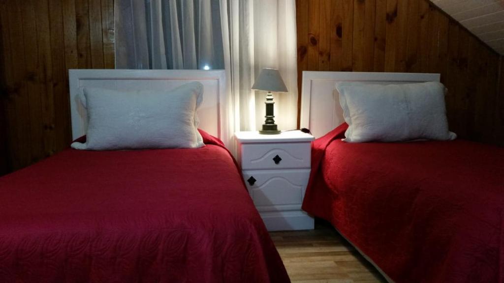 Postel nebo postele na pokoji v ubytování Hotel y Cabañas Molino Viejo
