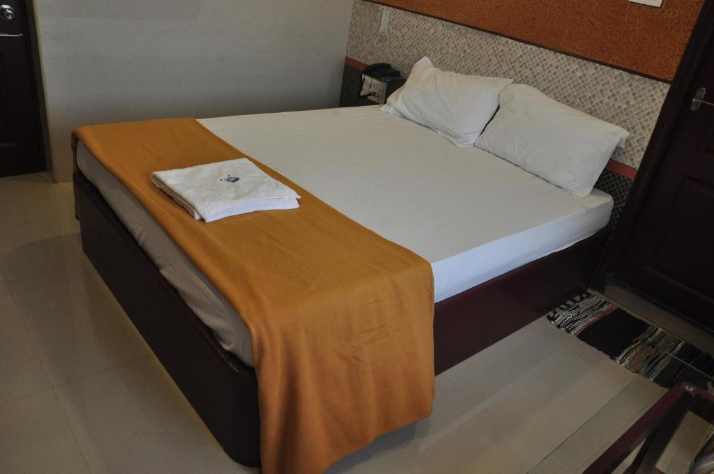 Postel nebo postele na pokoji v ubytování SSR Hotel