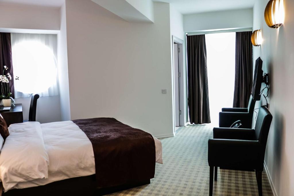 Postel nebo postele na pokoji v ubytování Best Western Hotel Galla