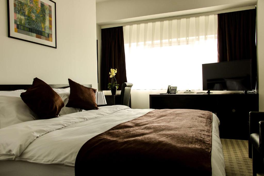 Postel nebo postele na pokoji v ubytování Best Western Hotel Galla