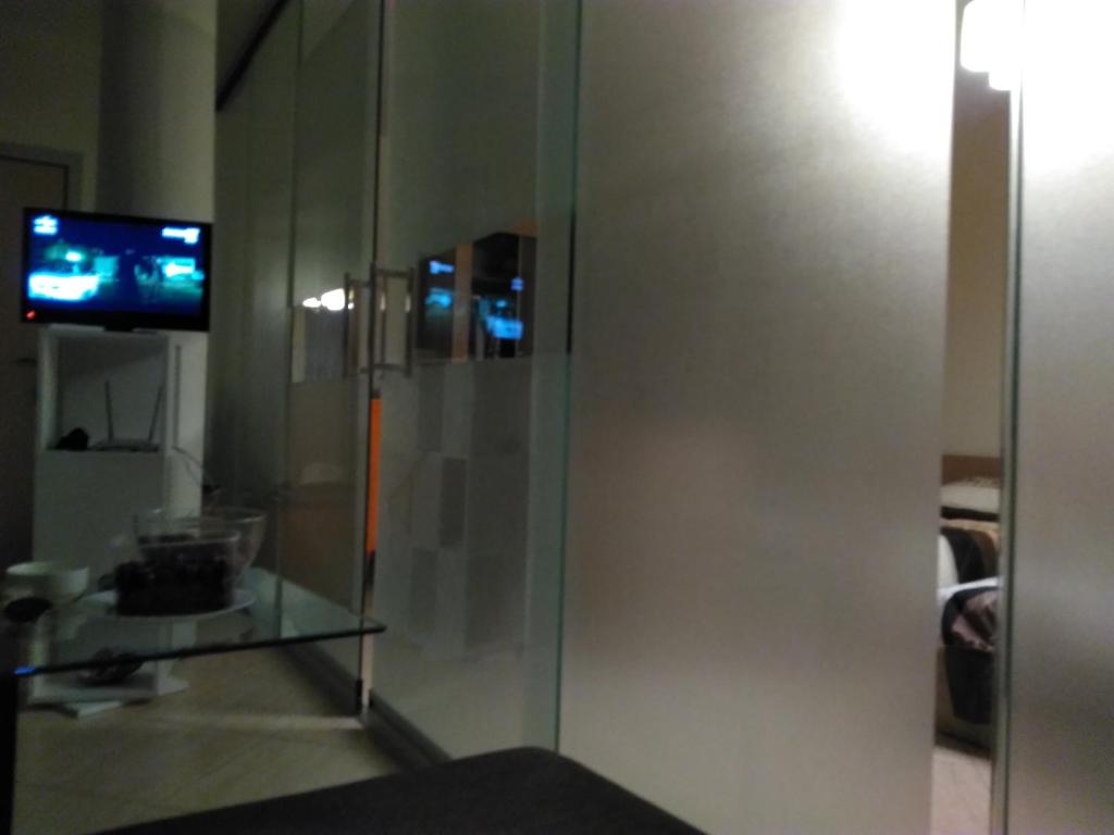 TV a/nebo společenská místnost v ubytování Grand Midia Resort, Sky level apartments