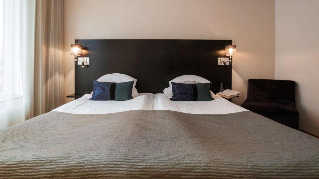 Postel nebo postele na pokoji v ubytování Best Western Plus Time Hotel
