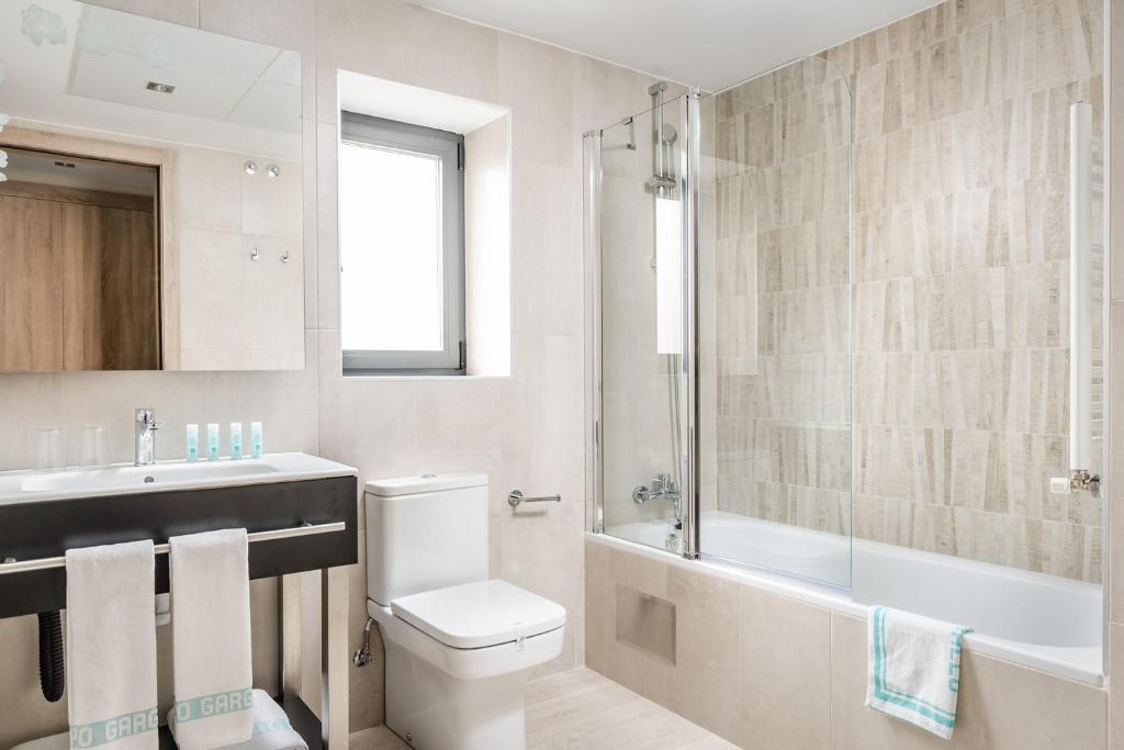 Koupelna v ubytování Hotel Civera