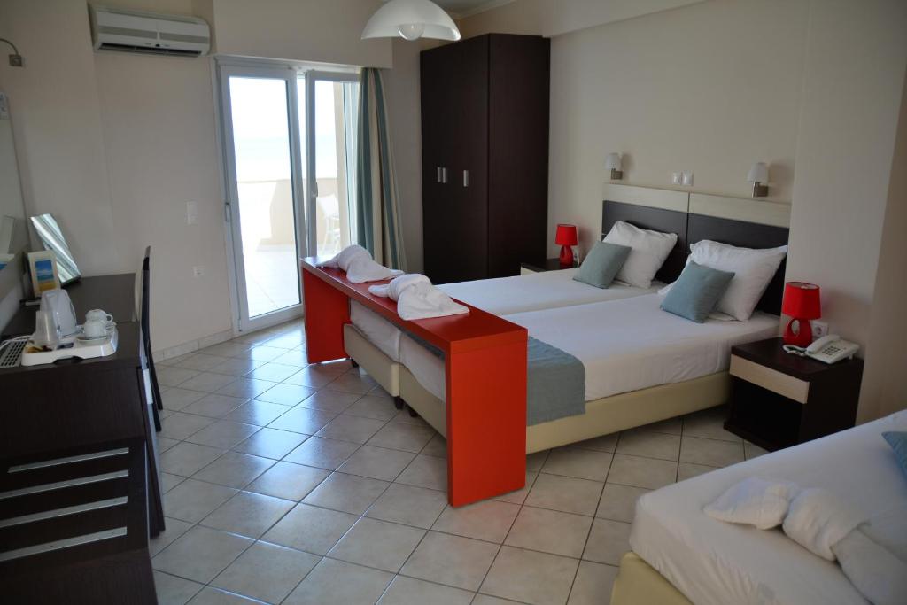 Postel nebo postele na pokoji v ubytování Al Mare Hotel