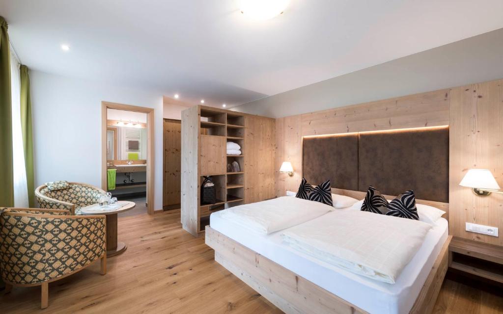 Postel nebo postele na pokoji v ubytování Hotel Oberbrunn
