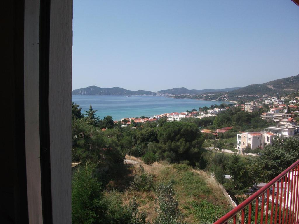 a view of the ocean from a balcony at Konstantina’s House in Paleo Tsifliki
