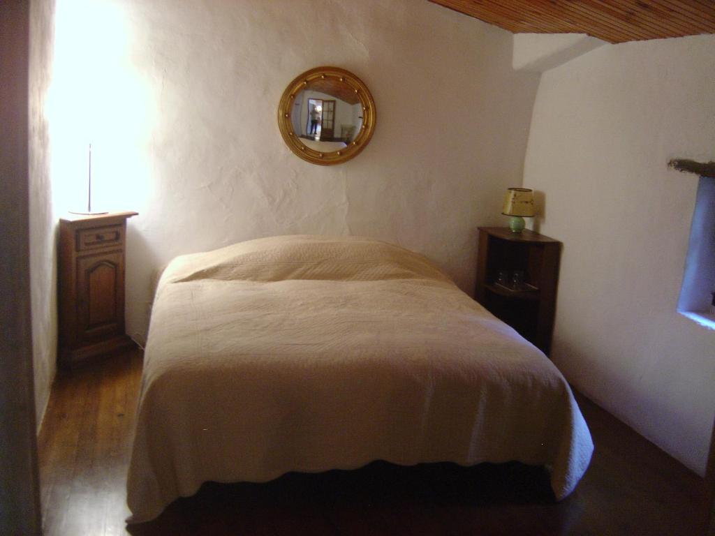 Postel nebo postele na pokoji v ubytování Belle de Nuit