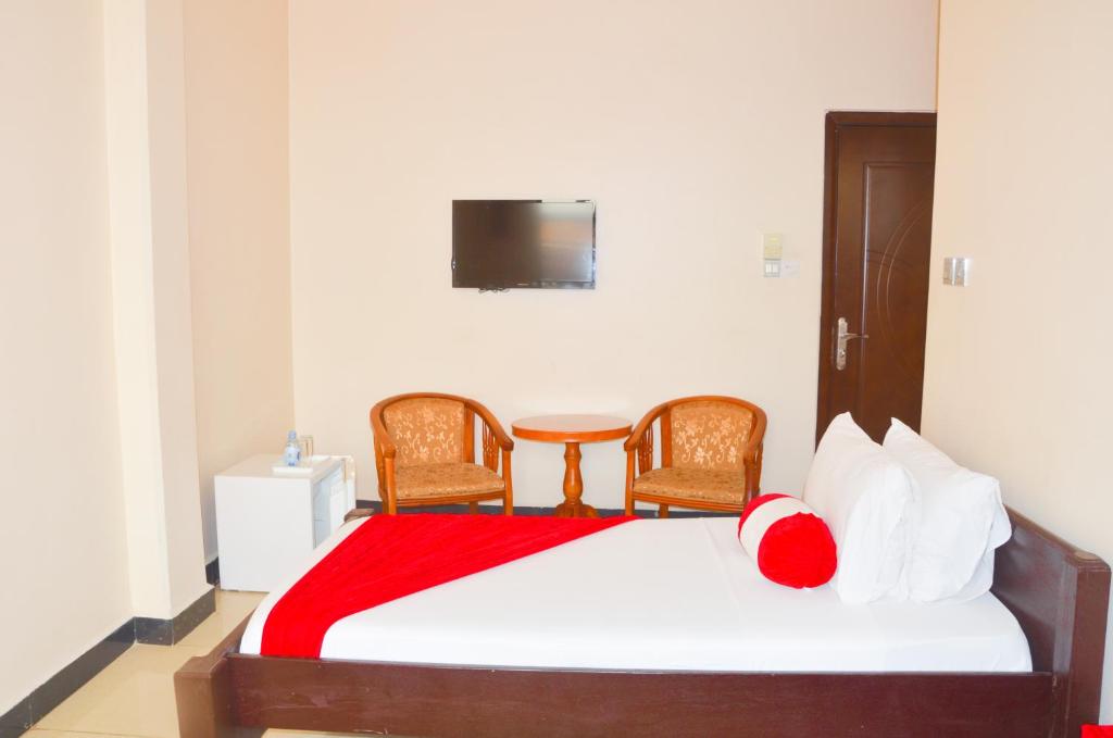 Postel nebo postele na pokoji v ubytování Dreams Hotel Zanzibar