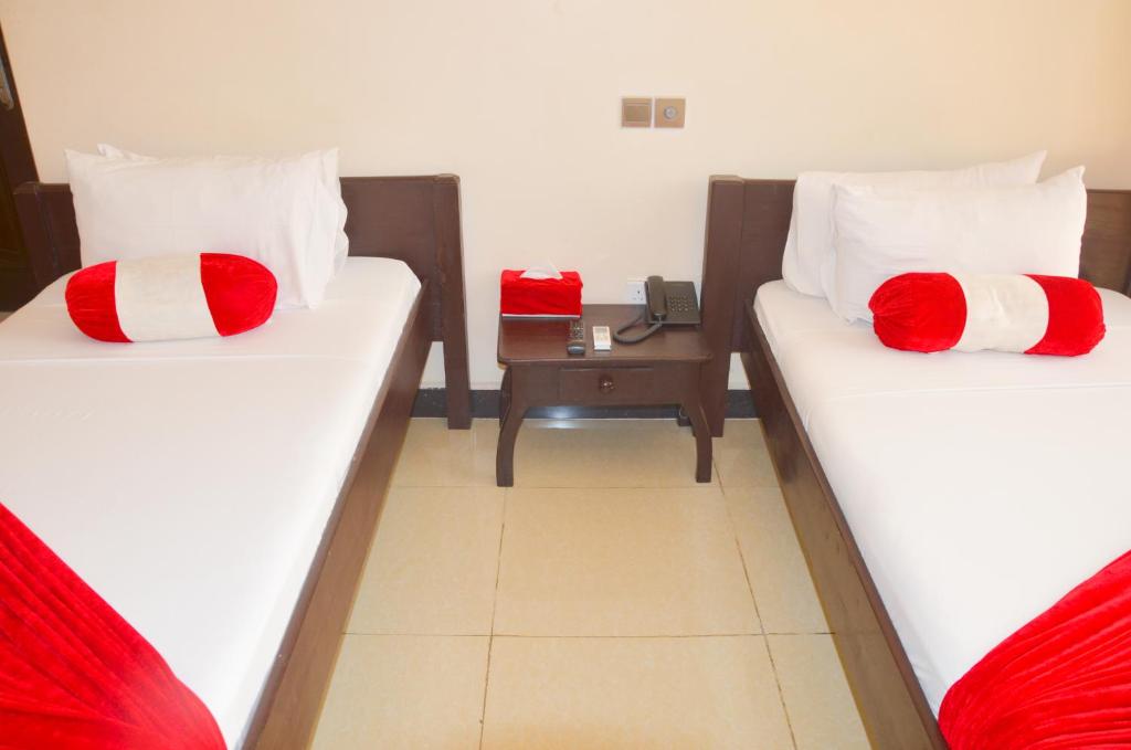 Postel nebo postele na pokoji v ubytování Dreams Hotel Zanzibar