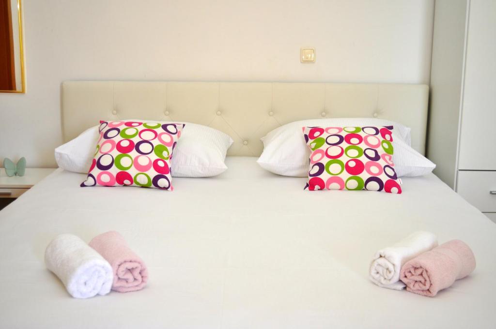 Postel nebo postele na pokoji v ubytování Apartments Ivica