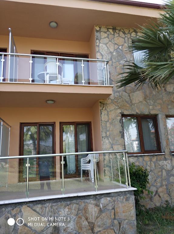 Balkón nebo terasa v ubytování The Palm Apart Sarigerme