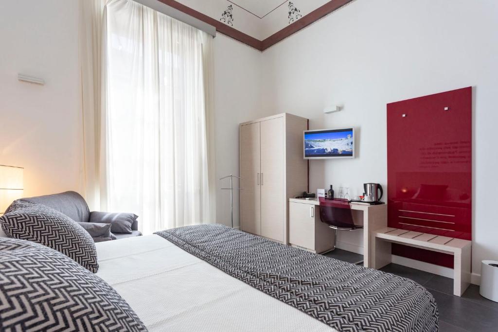 TV a/nebo společenská místnost v ubytování Nostos rooms & Apartments