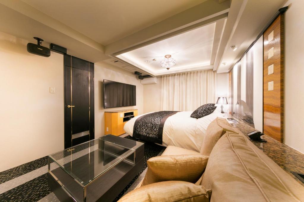 Postel nebo postele na pokoji v ubytování Hotel Eldia Modern Kobe(Adult Only)