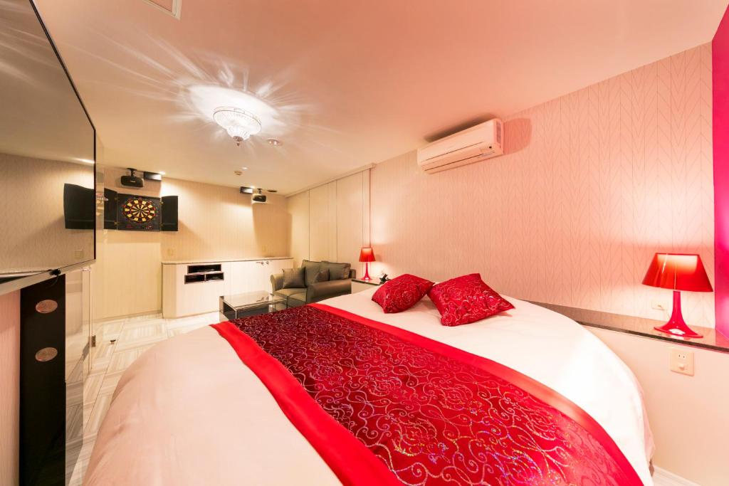 Postel nebo postele na pokoji v ubytování Hotel Eldia Modern Kobe(Adult Only)