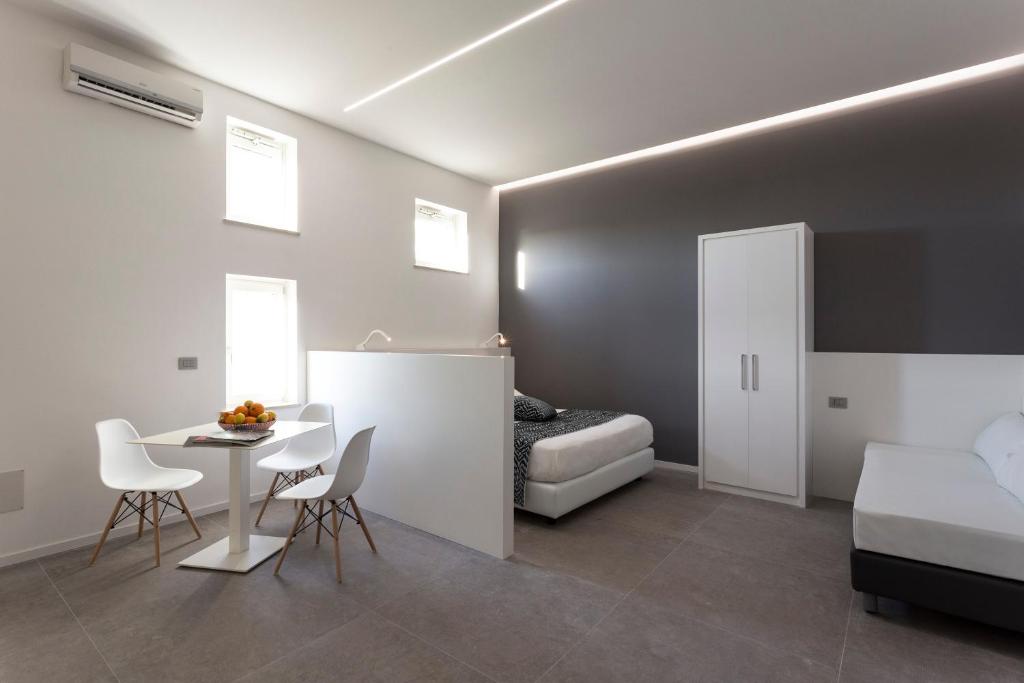 Postel nebo postele na pokoji v ubytování Nostos rooms & Apartments