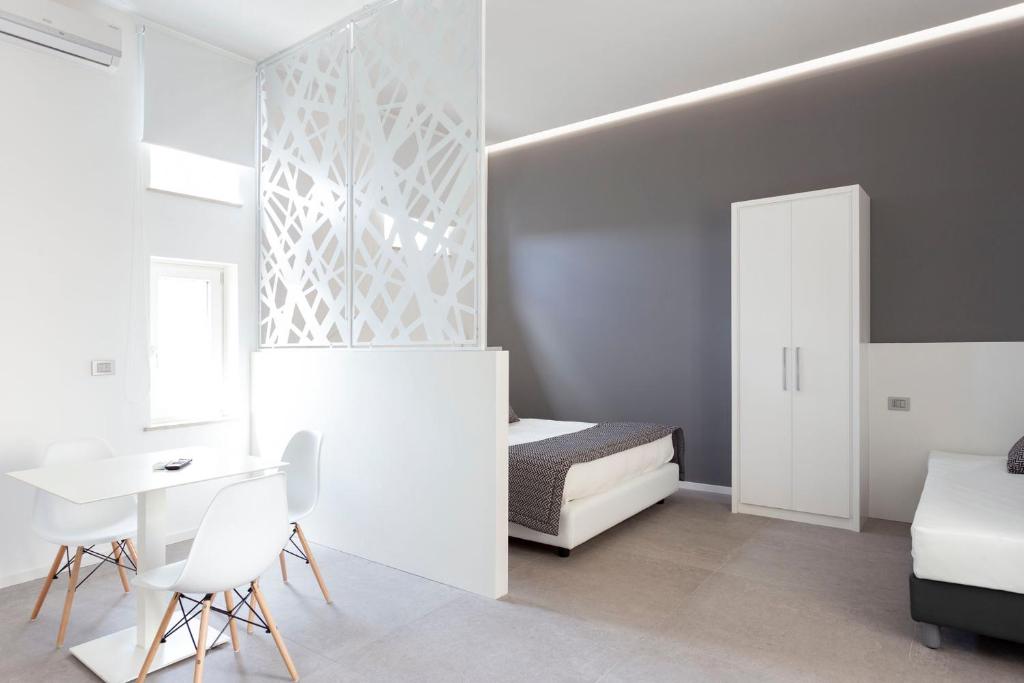 Postel nebo postele na pokoji v ubytování Nostos rooms & Apartments