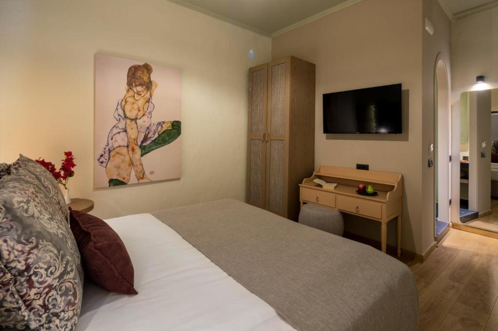 Postel nebo postele na pokoji v ubytování ELG Contessa Boutique Hotel