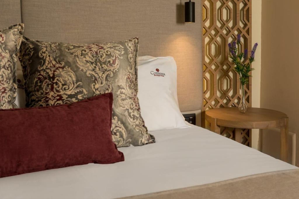 Postel nebo postele na pokoji v ubytování ELG Contessa Boutique Hotel