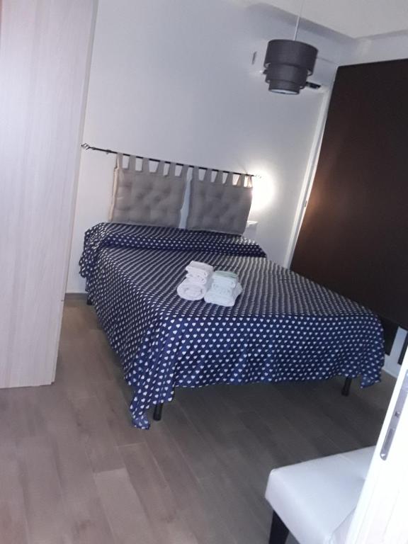 Łóżko lub łóżka w pokoju w obiekcie Villa sul porto