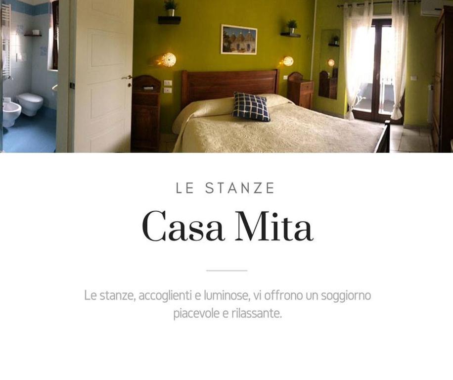 Postel nebo postele na pokoji v ubytování Casa Mita