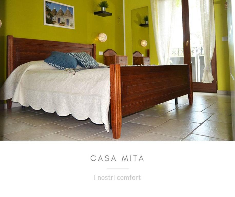 Postel nebo postele na pokoji v ubytování Casa Mita