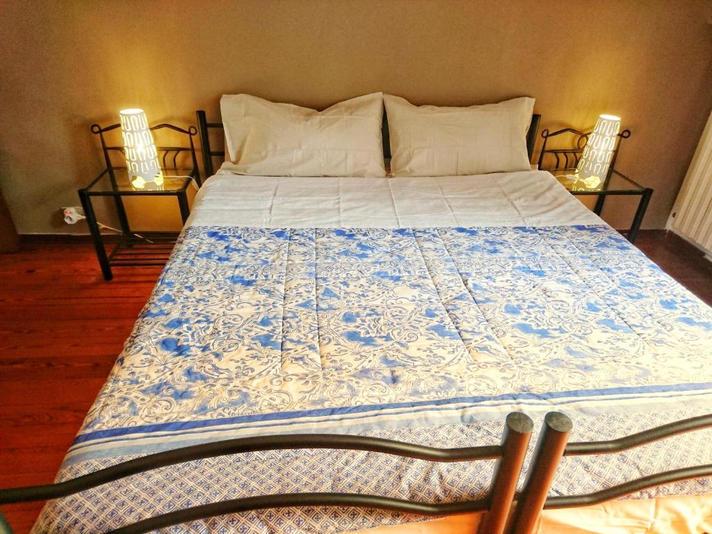 Voodi või voodid majutusasutuse Gran Torino toas