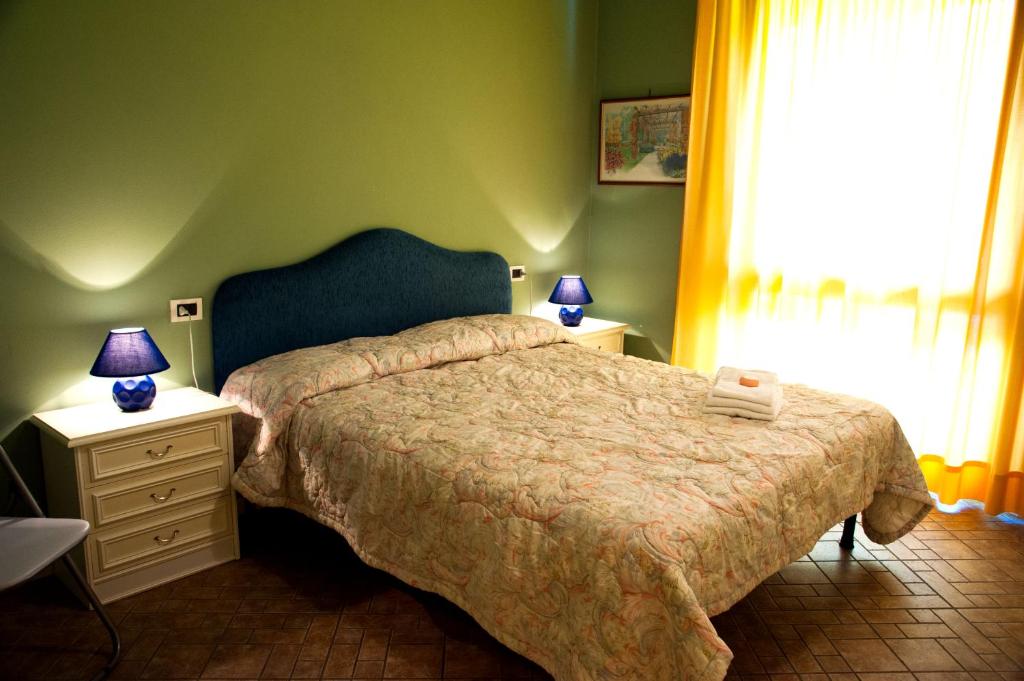 Postel nebo postele na pokoji v ubytování Residence Tourist