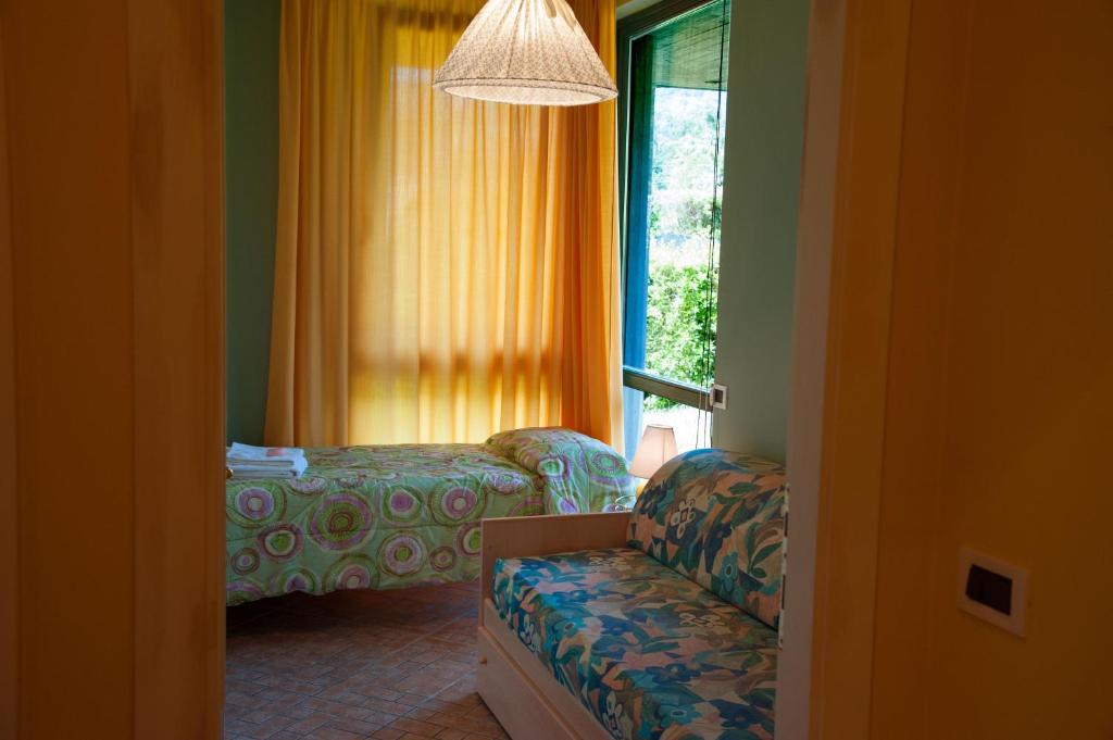 Postel nebo postele na pokoji v ubytování Residence Tourist