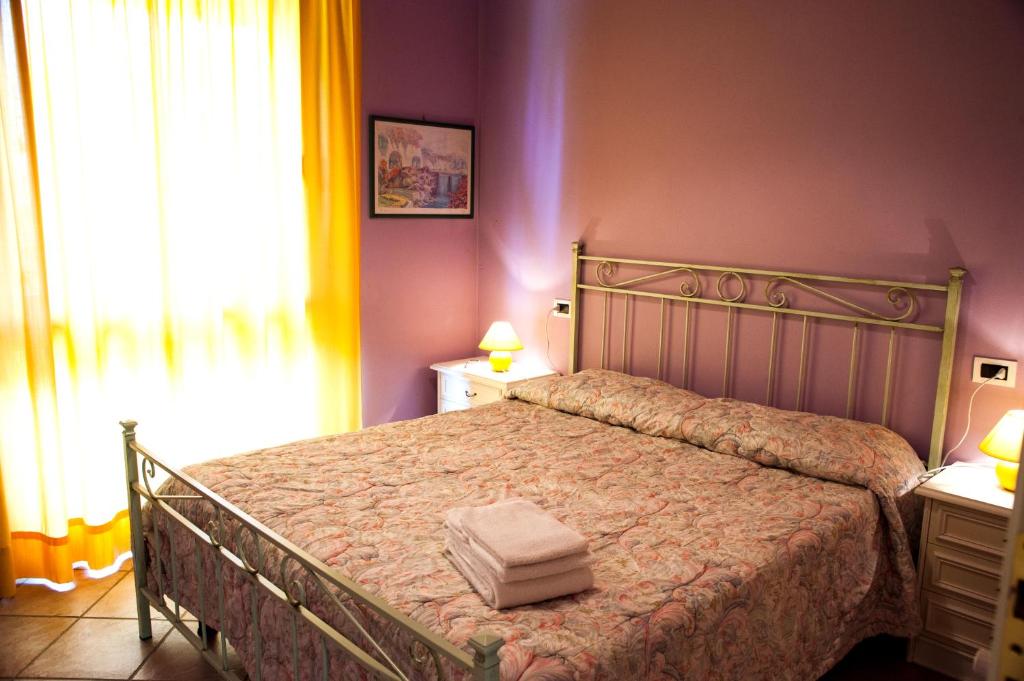 Postel nebo postele na pokoji v ubytování Residence Tourist