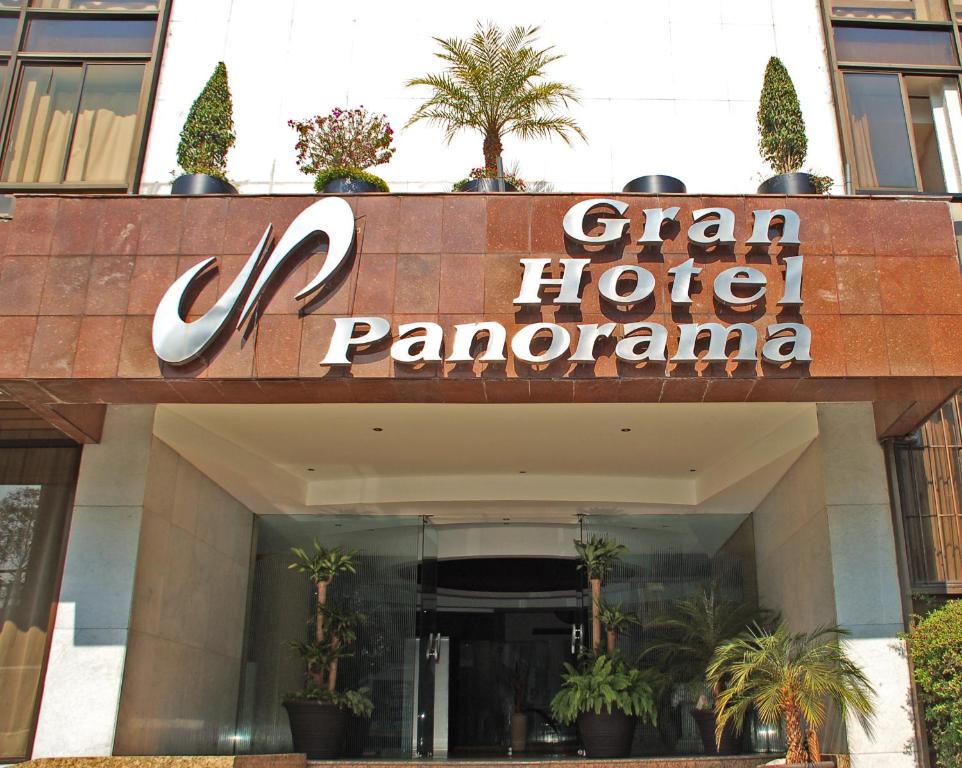 a sign for agan hotel pamona in front of a building at Panorama Hotel  in Mexico City