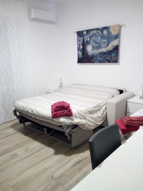 Posteľ alebo postele v izbe v ubytovaní Casa Perennio