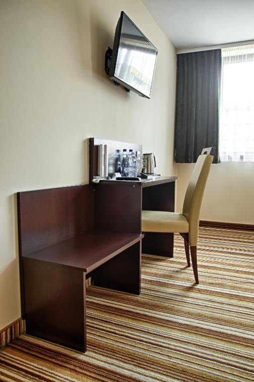 TV a/nebo společenská místnost v ubytování Boutique Hotel's Kwiska - Legnicka