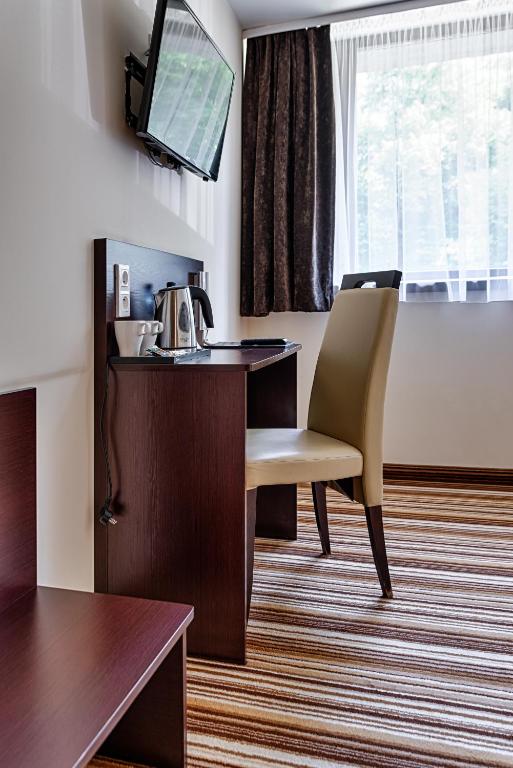 TV a/nebo společenská místnost v ubytování Boutique Hotel's Kwiska - Legnicka