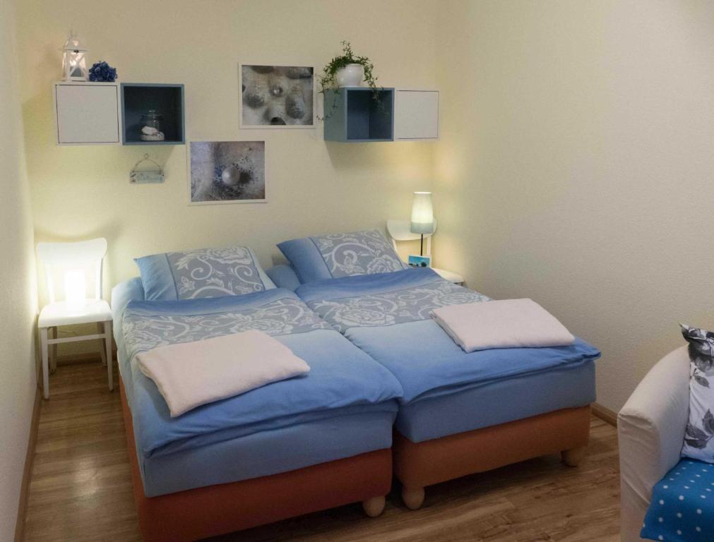 Postel nebo postele na pokoji v ubytování Pension im Adventhaus