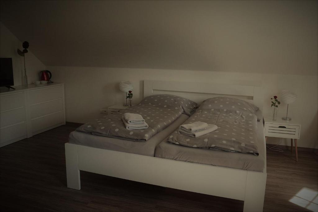 Postel nebo postele na pokoji v ubytování Penzion a relax centrum Andělka