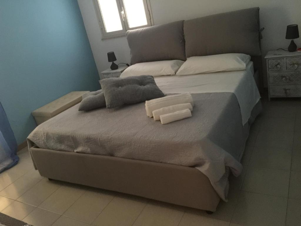 Postel nebo postele na pokoji v ubytování Villa Priscilla