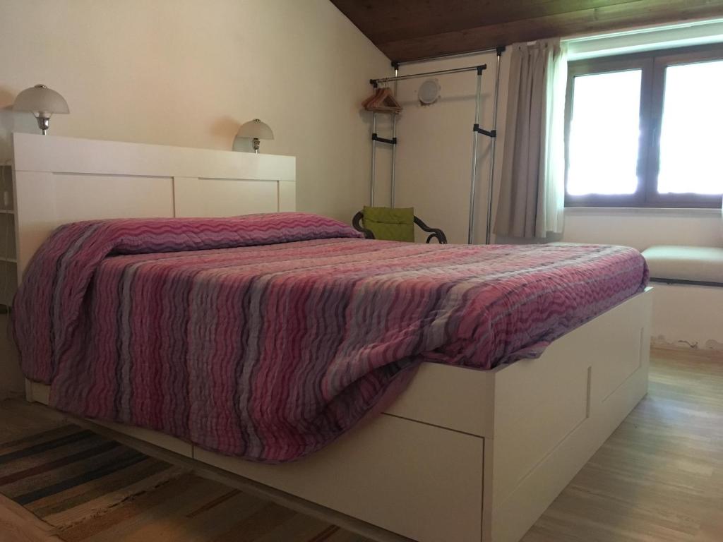 Postel nebo postele na pokoji v ubytování Bosco delle Rune ..un angolo di paradiso