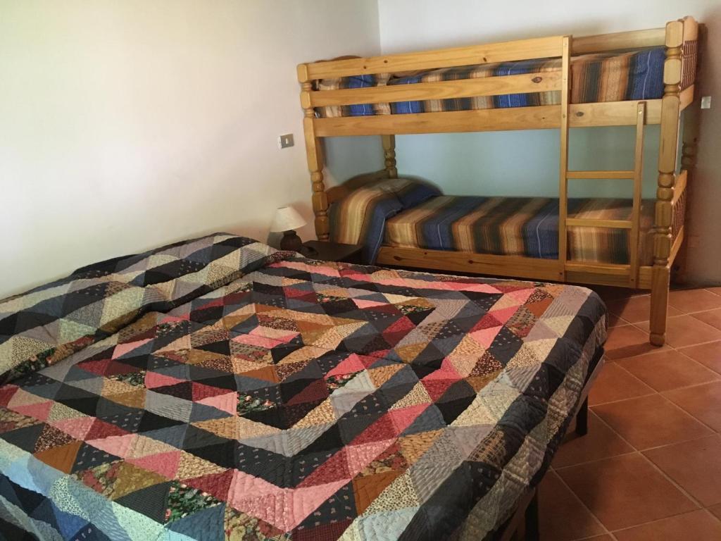 Postel nebo postele na pokoji v ubytování Bosco delle Rune ..un angolo di paradiso