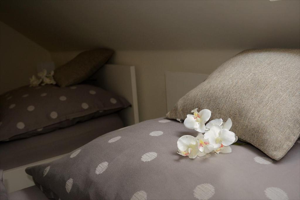 Postel nebo postele na pokoji v ubytování Penzion a relax centrum Andělka