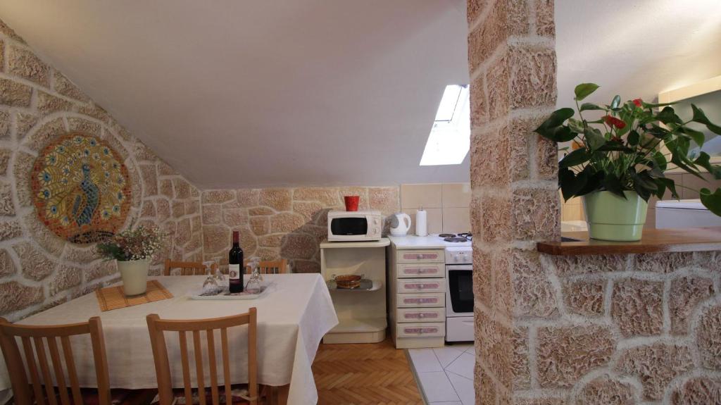 Kuchyň nebo kuchyňský kout v ubytování Apartment Ivanka
